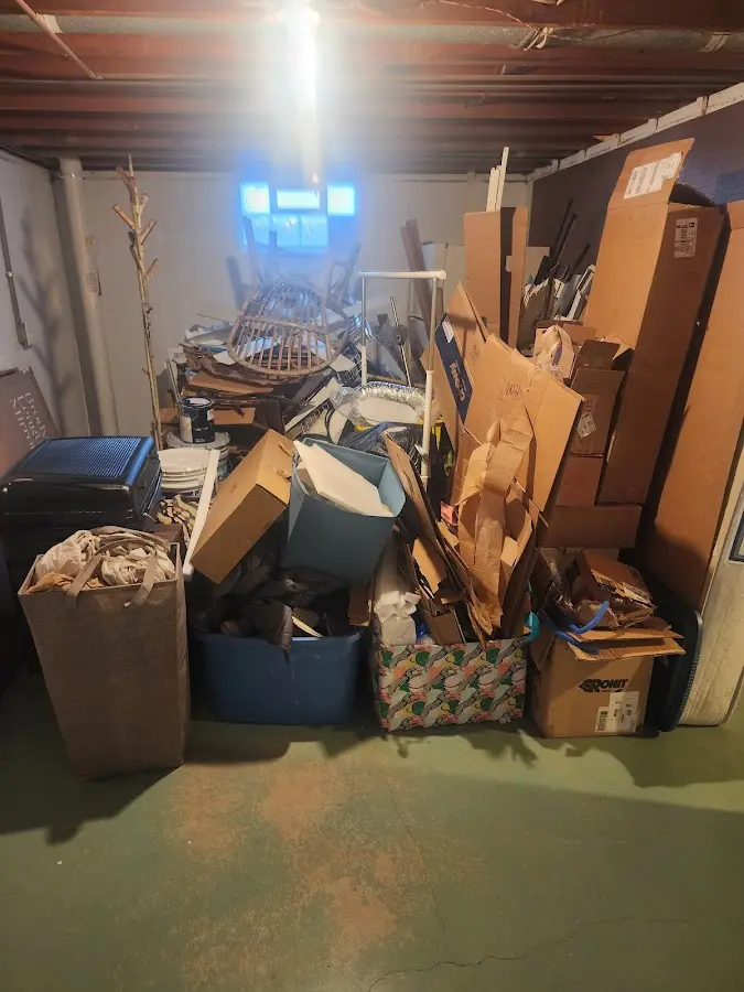 Roll-off dumpster container at job site for Concrete Dumpster Rental in Lawrenceville